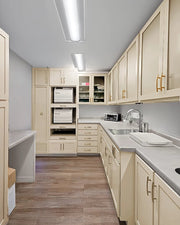 Contemporary Utility Room with Streamlined Storage and Workspace