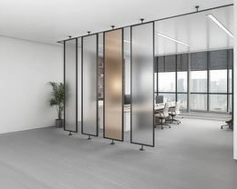 Suspended Frosted Glass Blade Partitions for Adaptive Work Environments