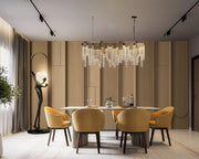 Dining room design with white marble top and yellow velvet chairs.