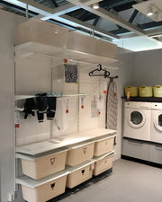 Streamlined Open-Frame Laundry Wall with High-Capacity Bin Storage
