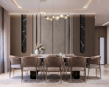 Dining room design with white marble top and brown velvet chairs.