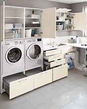 High-Function White Modular Laundry Room with Full-Cabinet Accessibility