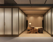 Zen-Inspired Frosted Glass Partitions Framing a Sculptural Reception Niche