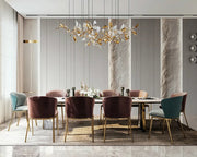Dining Room Featuring Blush and Teal Velvet Chairs