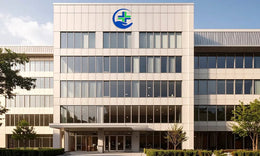 Minimalist Modular Hospital with Vertical Grid Façade and Monochrome Palette