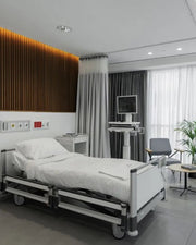 Sleek Minimalist Hospital Room with Warm Accent Paneling