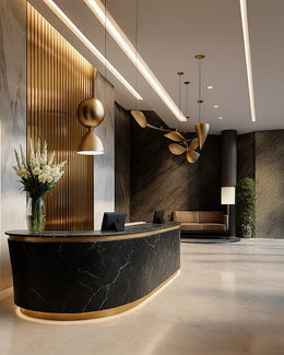 Luxury Hospitality-Inspired Lobby with Black Marble & Sculptural Gold Accents