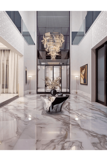 Double-Height Grand Foyer with Contemporary Marble Elegance