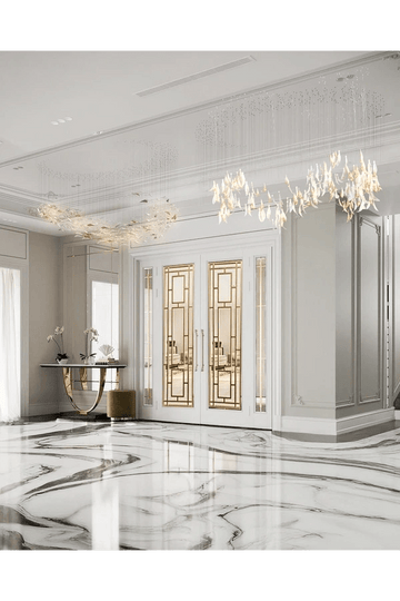 Grand Luxe Foyer with Gold Accents and Artistic Chandelier