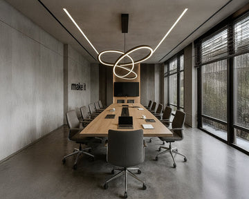 Industrial-Modern Conference Room with Sculptural Flair and Focused Utility