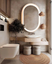 Earthtone Vanity Nook with Sculpted Stone Basin & Oval Backlit Mirror