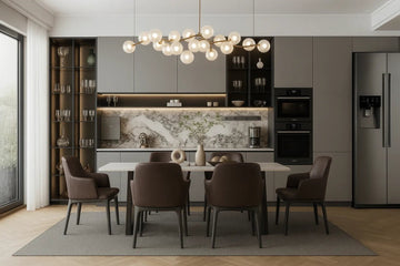 Minimalist Luxury Kitchen-Dining Space with Marble Accents and Contemporary Lighting