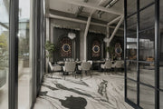 Sophisticated Modern Dining Area with Dramatic Marble Flooring
