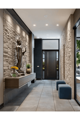 Serene Foyer Design with Buddha Statue and Textured Stone Wall