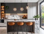 Modern Industrial Luxe Island Kitchen with Walnut Accents
